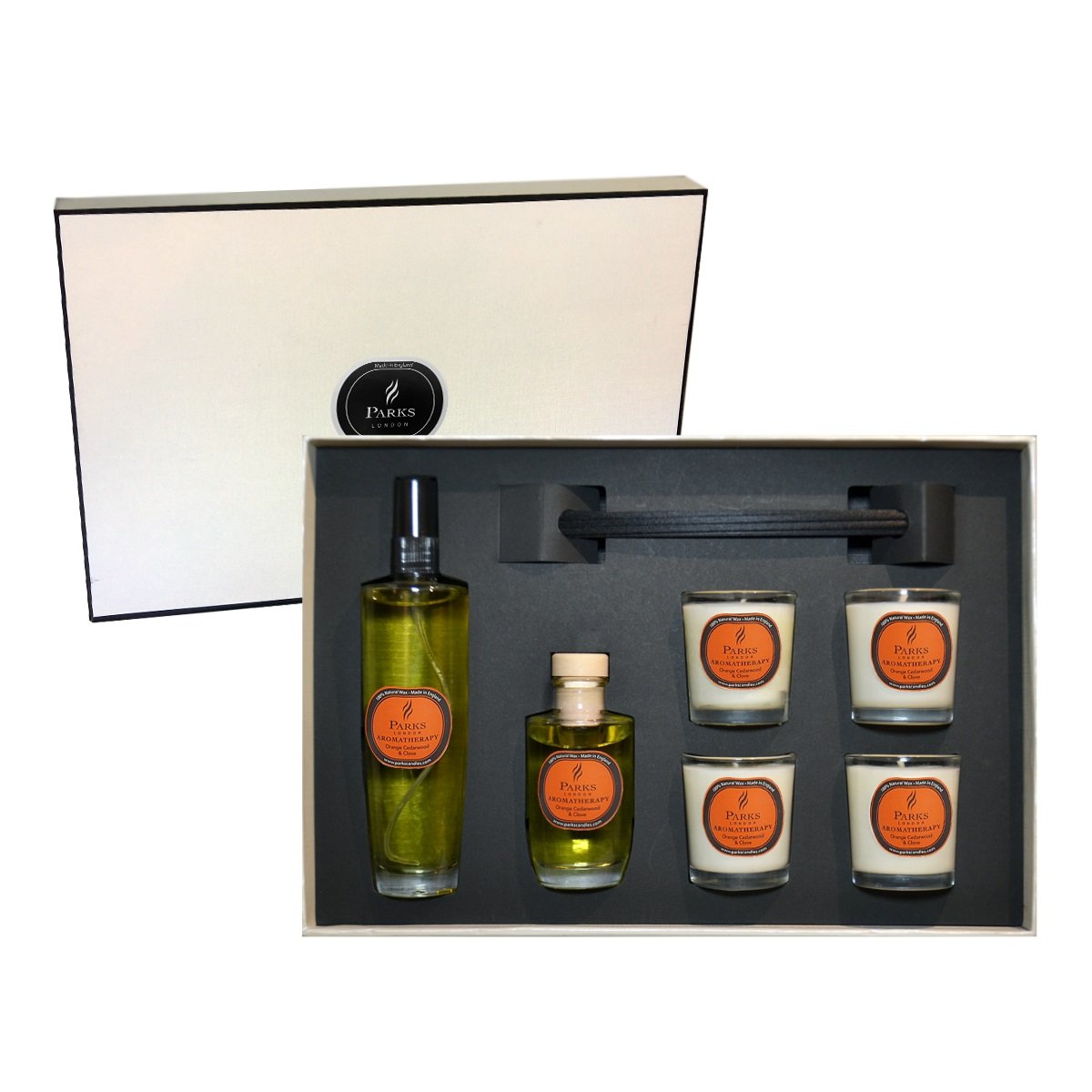 Parks London Orange Cedarwood Clove luxury gift set with 4 votive candles reed diffuser and room spray