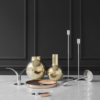 Nattlight silver plated brass candle holders designed by Richard Hutten and Boule, polished brass flower vases designed by Olivia Herms by Skultuna