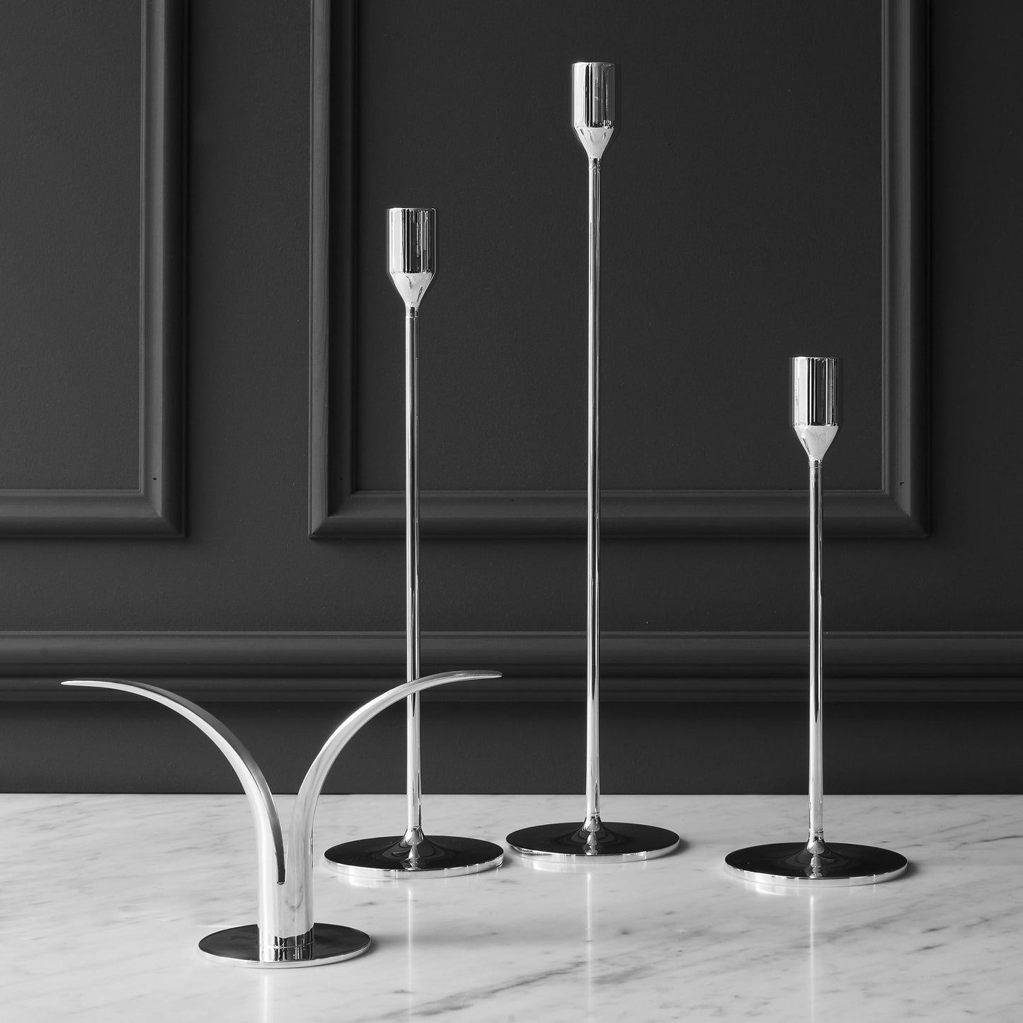 Silver-plated candle holders by Skultuna